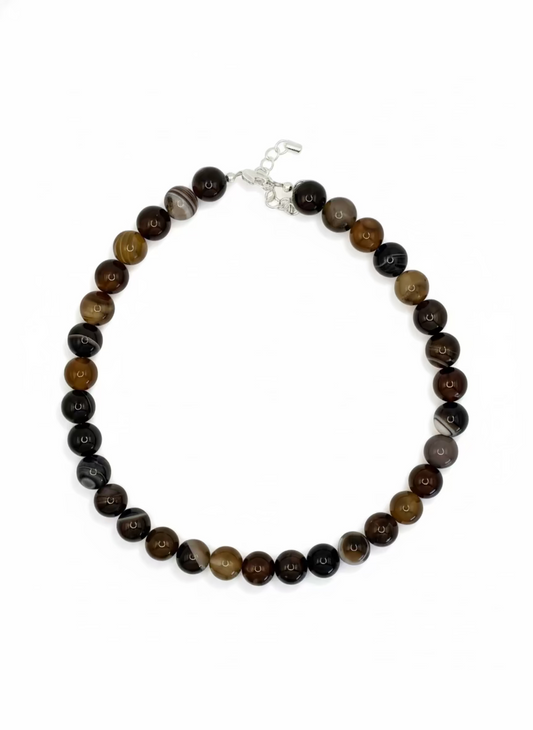 Beaded necklace with multicolored beads on a white background