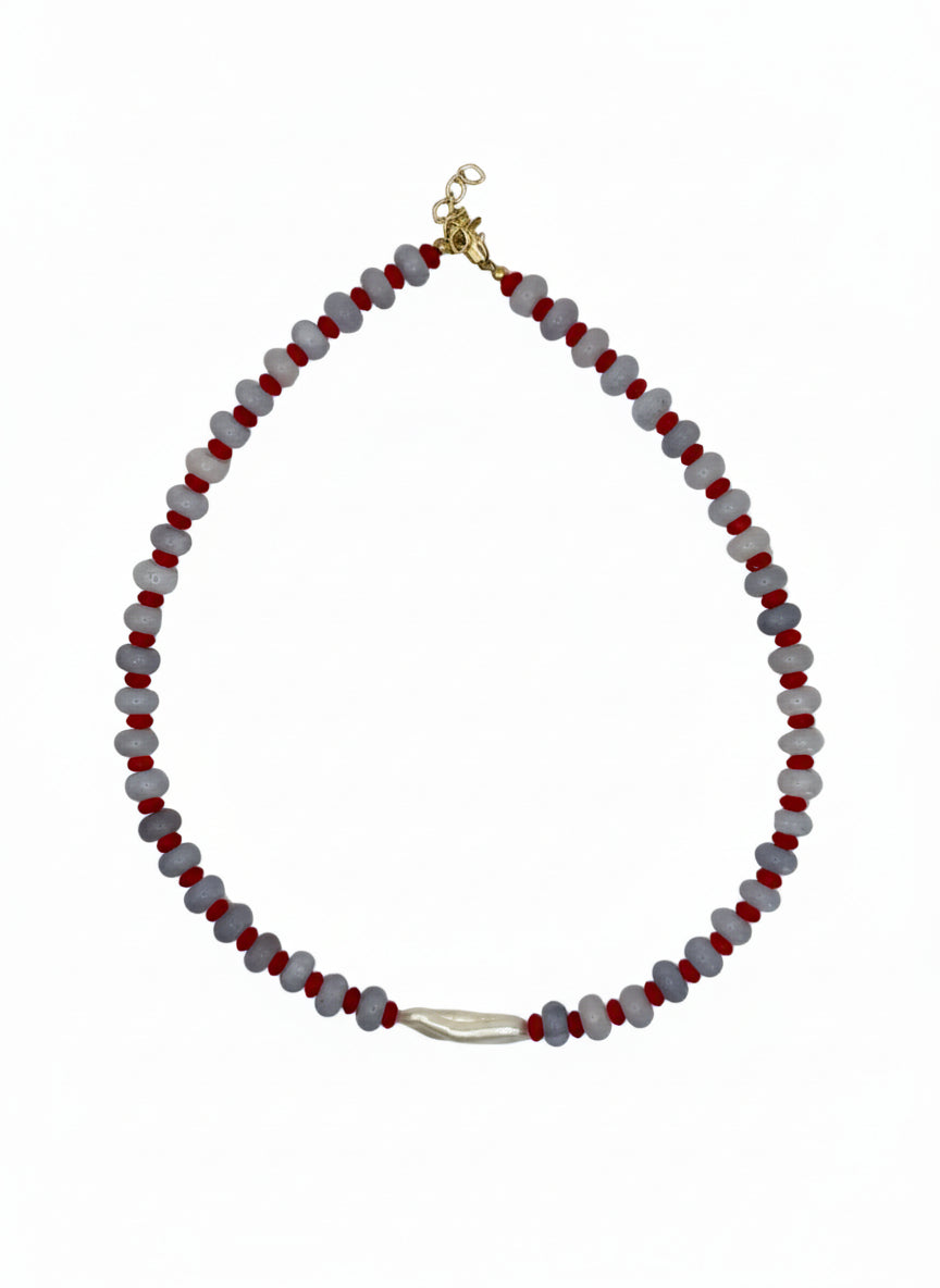 Necklace with red and gray beads on a white background