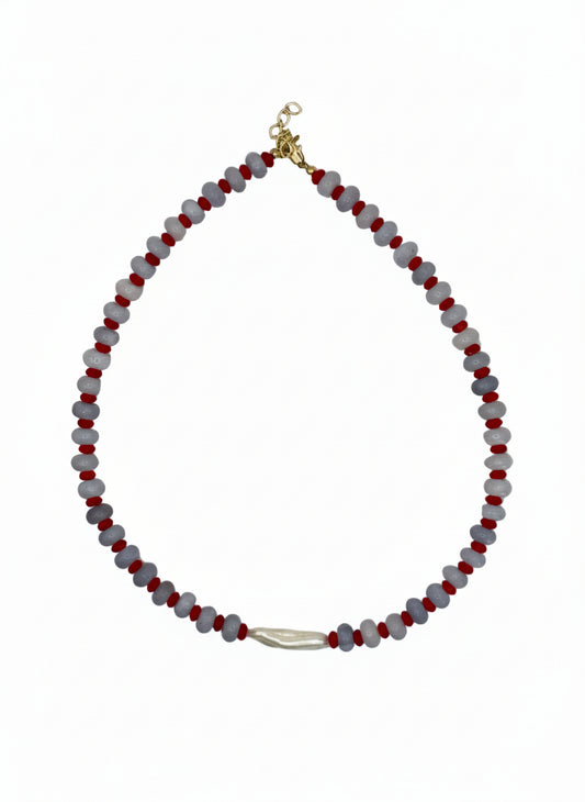 Necklace with red and gray beads on a white background