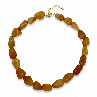 Necklace with brown beads on a white background